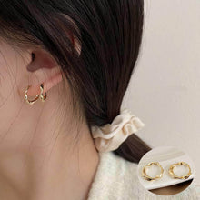 Load image into Gallery viewer, Skhek Simple Design Silver Color Hollow Heart Hoop Earrings For Women New Brand Fashion Ear Cuff Piercing Vintage Earring Gift