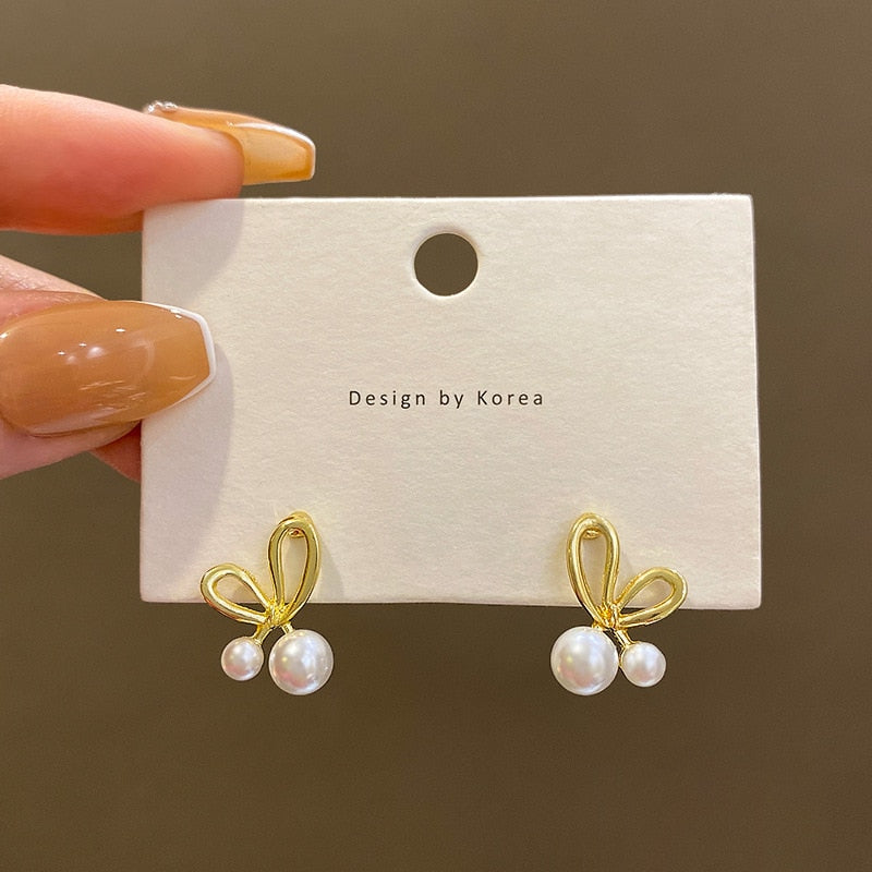Skhek Simple Design Silver Color Hollow Heart Hoop Earrings For Women New Brand Fashion Ear Cuff Piercing Vintage Earring Gift