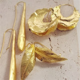 Skhek HUANZHI 2023 Retro Gold Color Metal Leaf Stud Earrings Geometric Irregular Plant Earring For Women Girls Party Travel Jewelry