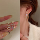 Skhek  fashion inspo    New Pearl Rhinestone Bear Love Earrings Female Exquisite Small Earrings Korea Simple Cute Earrings Female Party Jewelry